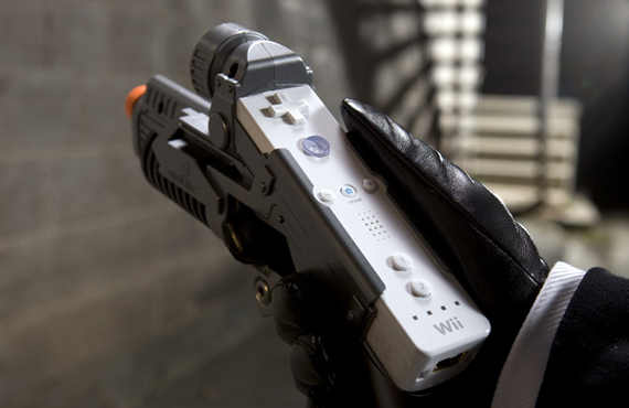 Cobalt Flux Wii Gun Industrial Design Slide 3- Marketing Photo of hand holding wii gun