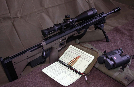Desert Tactical Prototyping Slide 2 - Desert Tactical marketing image gun, binoculars, and bullets